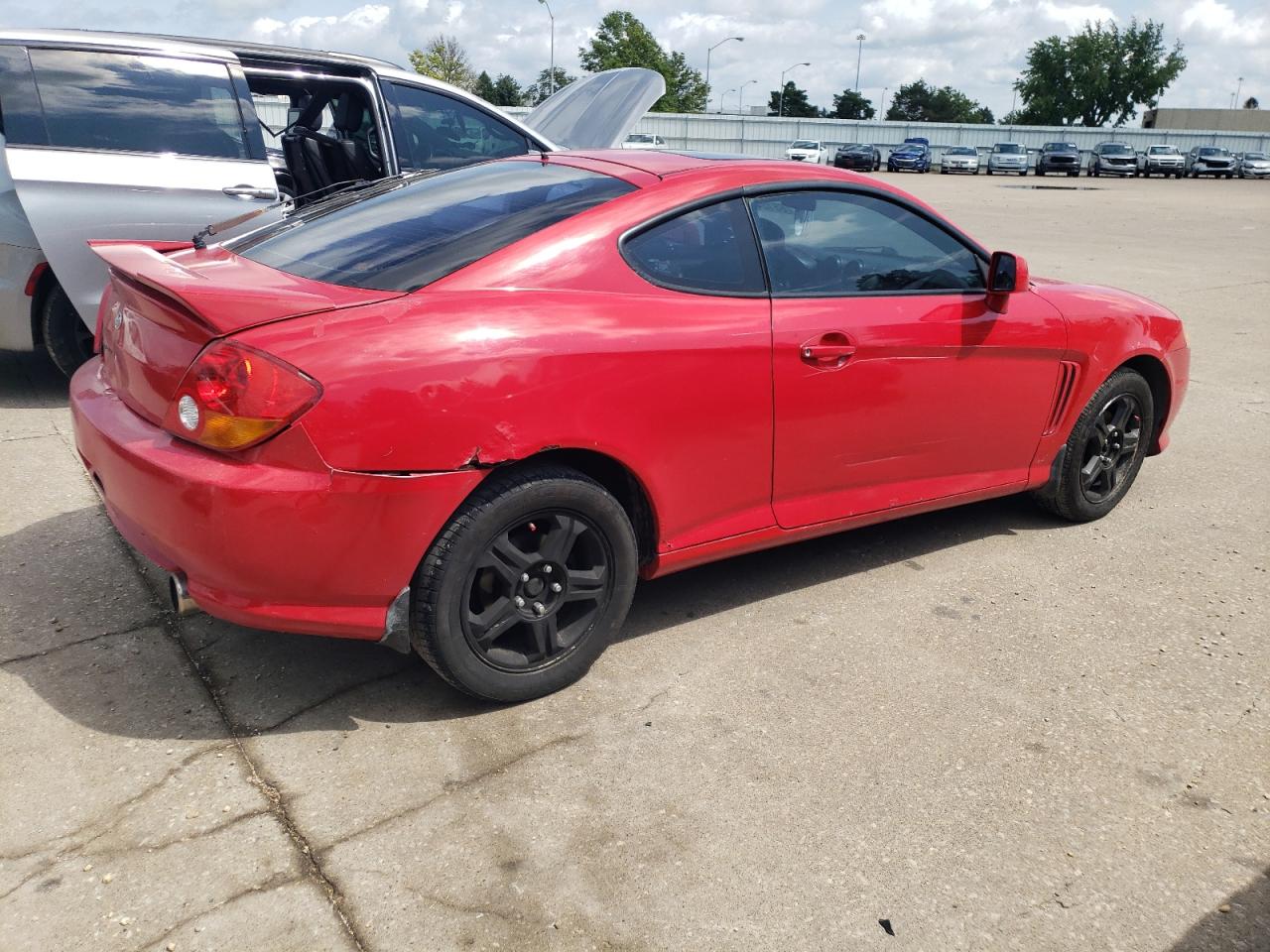 2003 Hyundai Tiburon VIN: KMHHM65D93U099044 Lot: 65124024