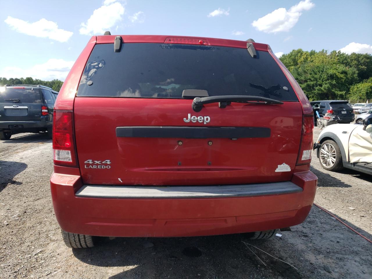 2009 Jeep Grand Cherokee Laredo VIN: 1J8GR48K99C554921 Lot: 63518344