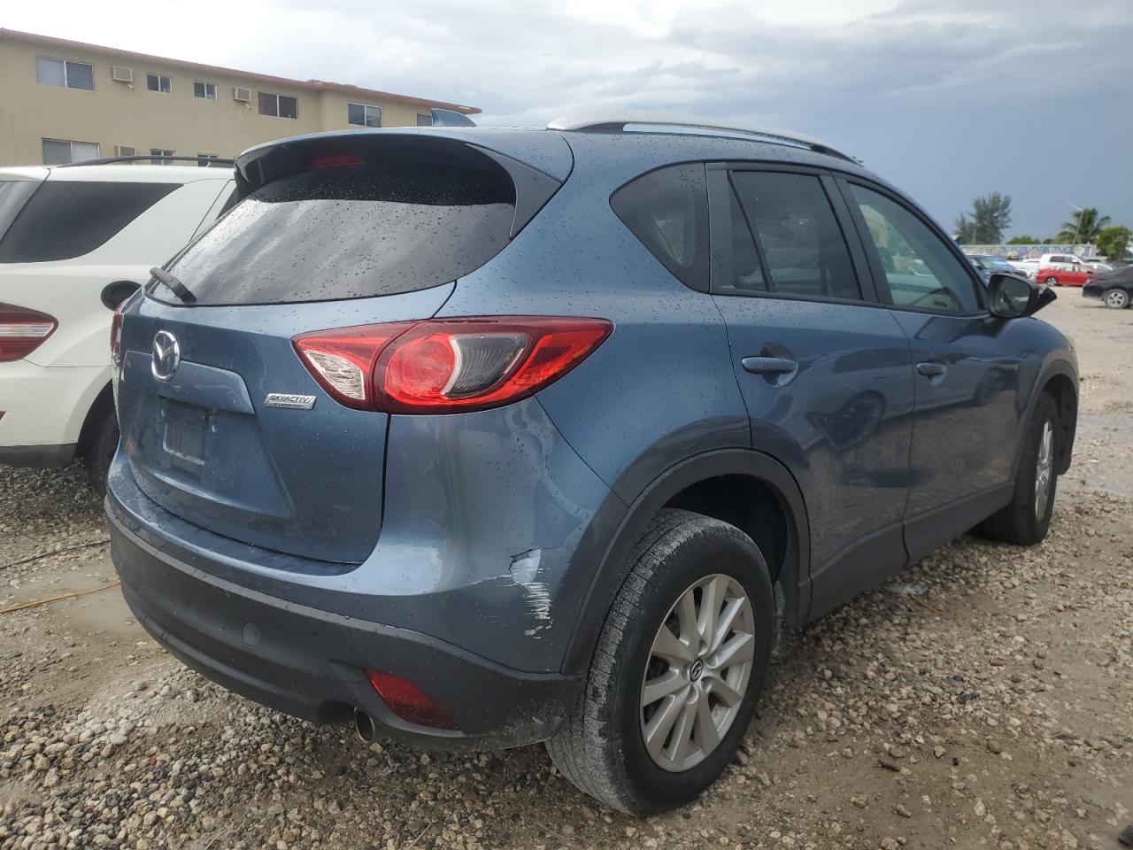 2015 Mazda Cx-5 Touring VIN: JM3KE2CY2F0473101 Lot: 63852674