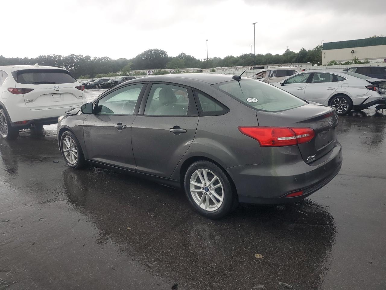 2015 Ford Focus Se VIN: 1FADP3F29FL258618 Lot: 65424704