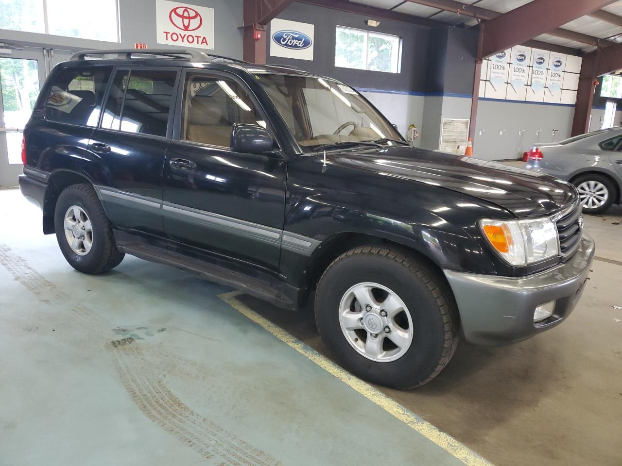 1999 Toyota Land Cruiser VIN: JT3HT05J2X0069086 Lot: 64736254