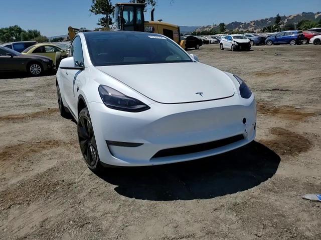 2023 Tesla Model Y VIN: 7SAYGDEE8PF745619 Lot: 63362154