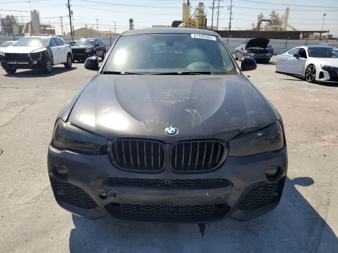 2015 BMW X4 xDrive35I VIN: 5UXXW5C5XF0E88594 Lot: 61596984