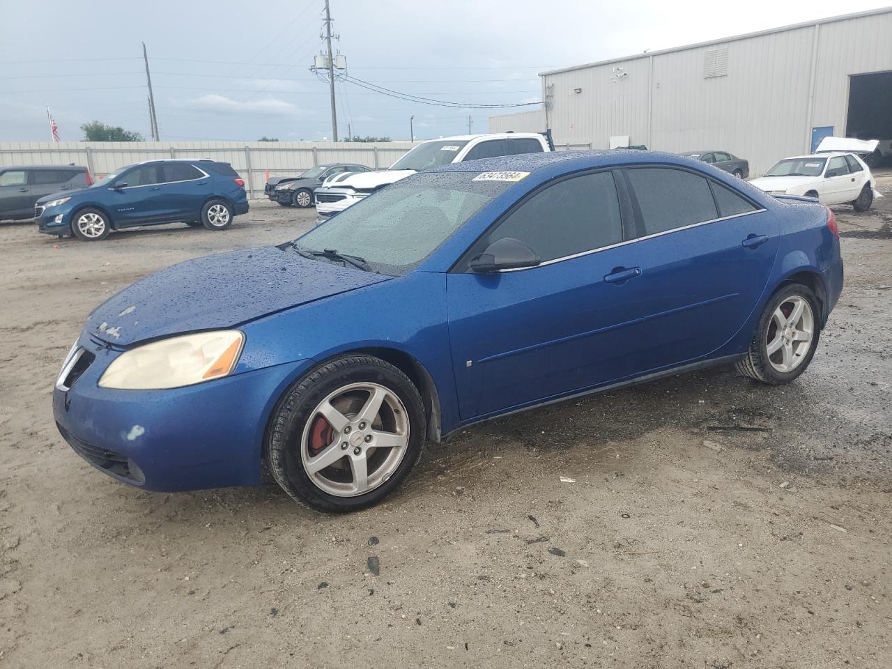 2007 Pontiac G6 Base VIN: 1G2ZG58N074107718 Lot: 63473564