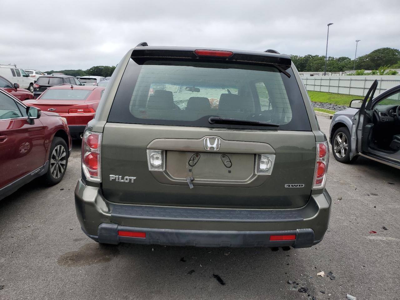 2006 Honda Pilot Lx VIN: 2HKYF18116H521230 Lot: 60423294