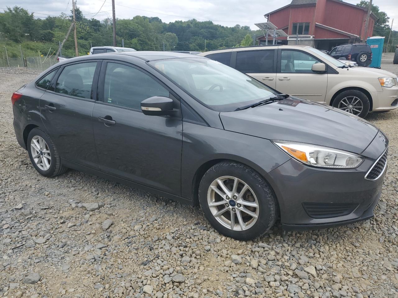 2016 Ford Focus Se VIN: 1FADP3F24GL377789 Lot: 63000184