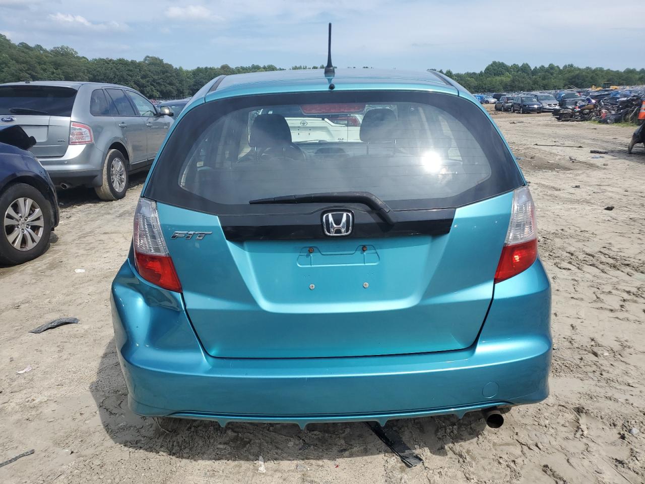 2012 Honda Fit VIN: JHMGE8H35CC040752 Lot: 63985964