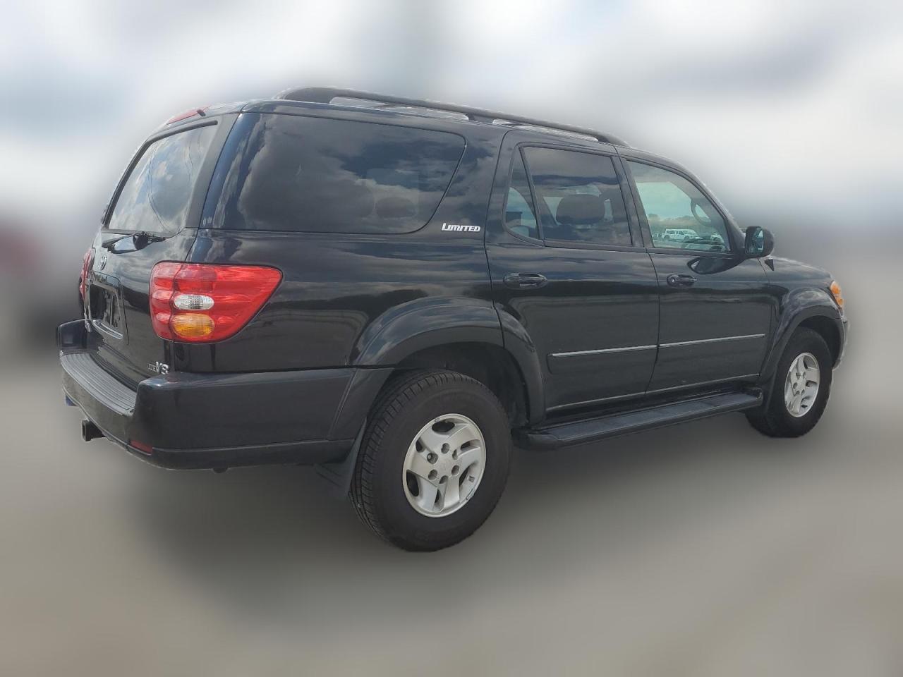 2002 Toyota Sequoia Limited VIN: 5TDZT38A52S057453 Lot: 63751324