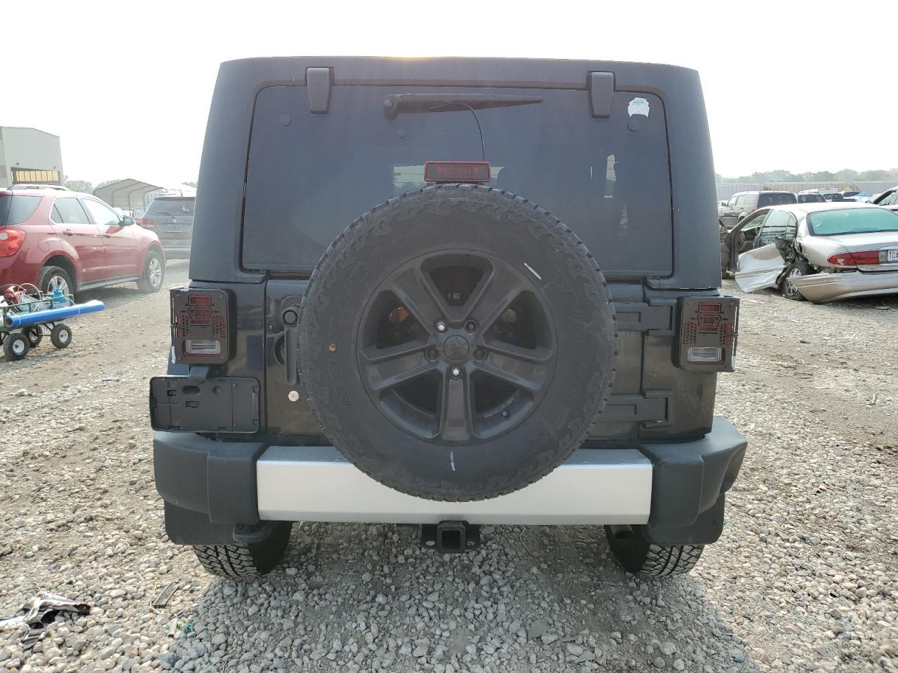 2011 Jeep Wrangler Unlimited Sahara VIN: 1J4BA5H10BL611951 Lot: 64041594