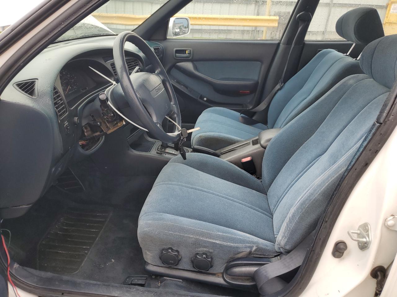 1993 Toyota Camry Le VIN: 4T1SK12E9PU210628 Lot: 65119444