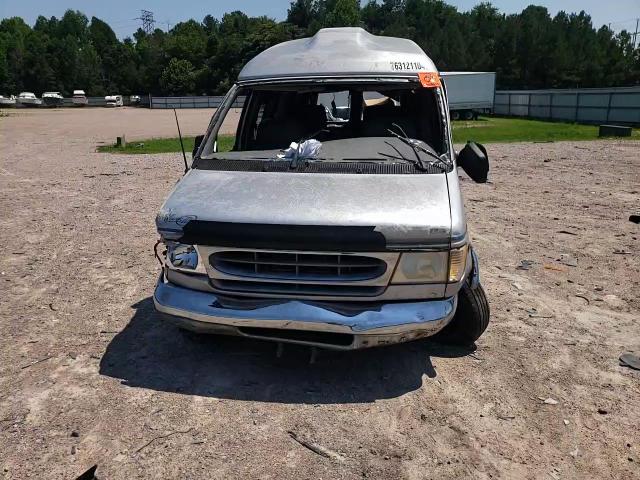 2000 Ford Econoline E150 Van VIN: 1FDRE14L0YHC02123 Lot: 63121104