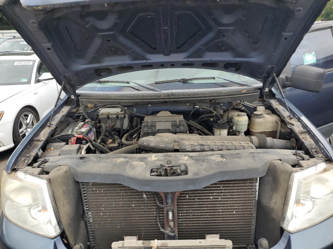 2005 Ford F150 VIN: 1FTPX14565NA11276 Lot: 64166394