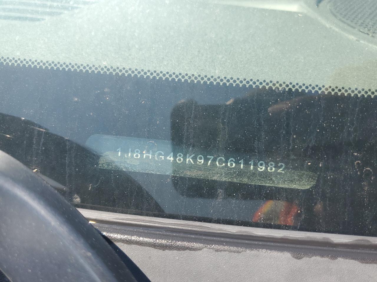 2007 Jeep Commander VIN: 1J8HG48K97C611982 Lot: 63478114