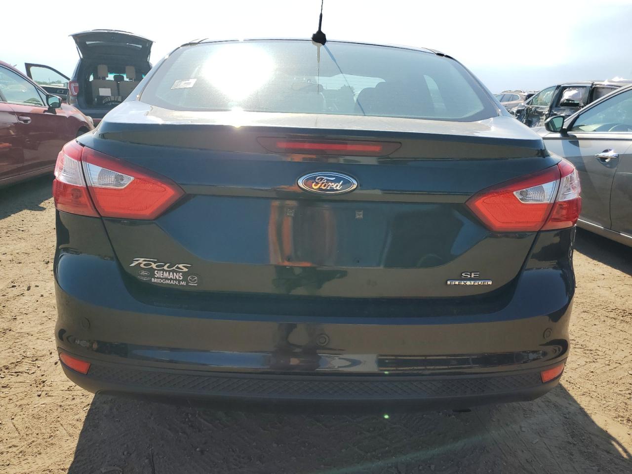 2014 Ford Focus Se VIN: 1FADP3F23EL148758 Lot: 62698464