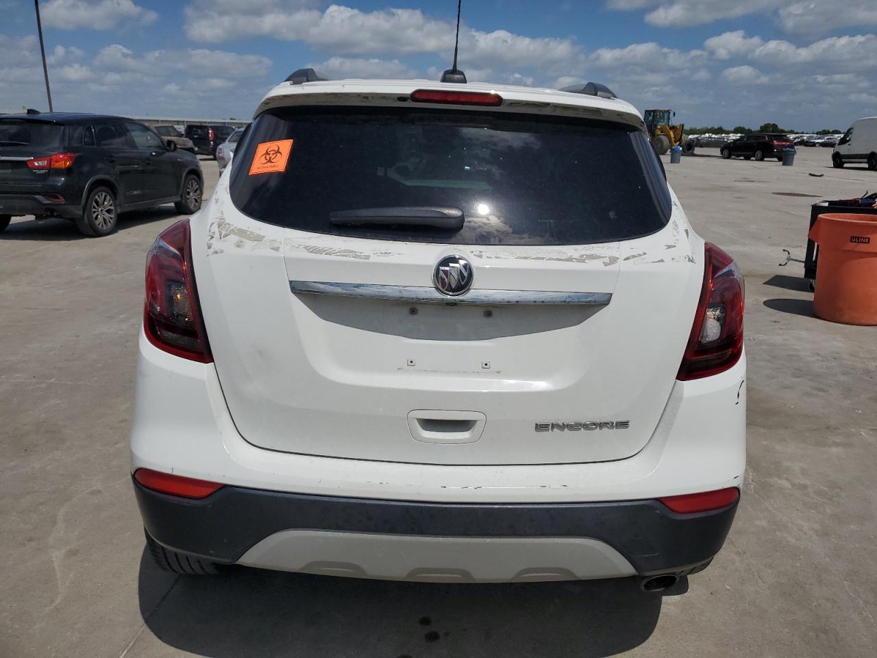 2019 Buick Encore Essence VIN: KL4CJCSM1KB889579 Lot: 65327254