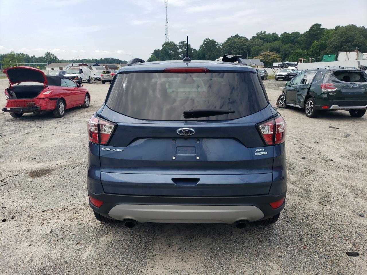 2018 Ford Escape Sel VIN: 1FMCU0HD8JUB09949 Lot: 62862194