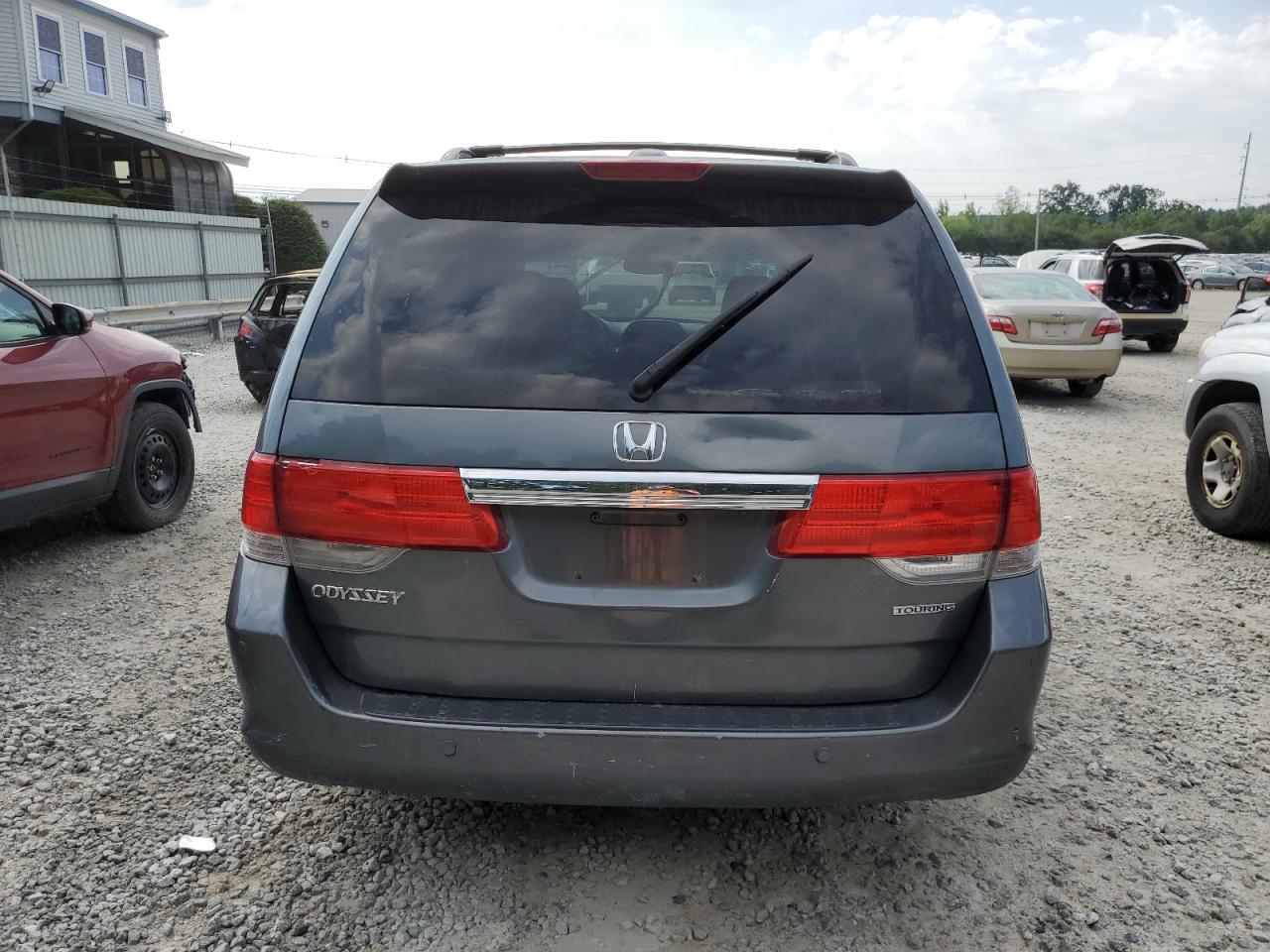 2010 Honda Odyssey Touring VIN: 5FNRL3H91AB066546 Lot: 62440024
