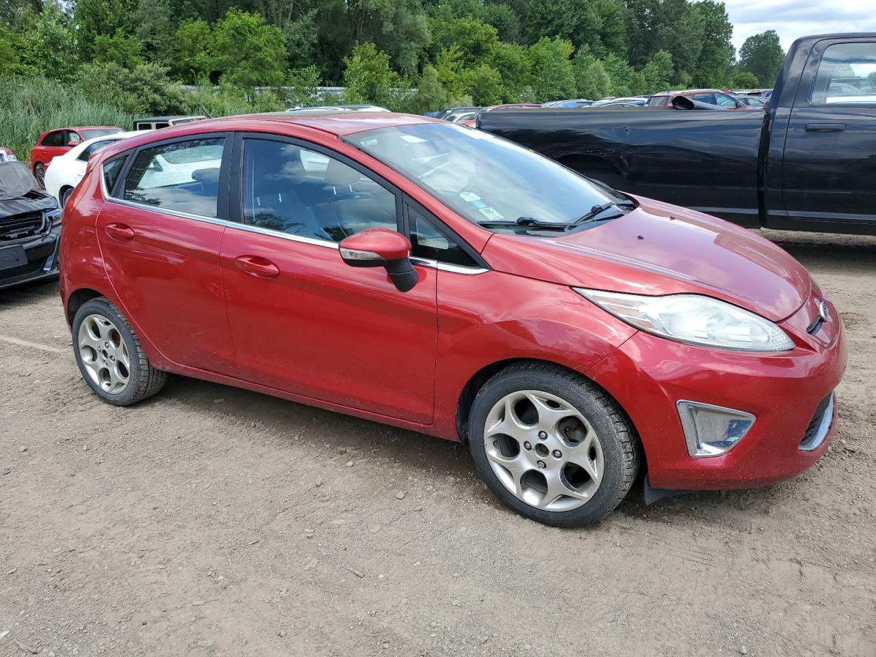 2011 Ford Fiesta Ses VIN: 3FADP4FJ0BM124991 Lot: 63063854