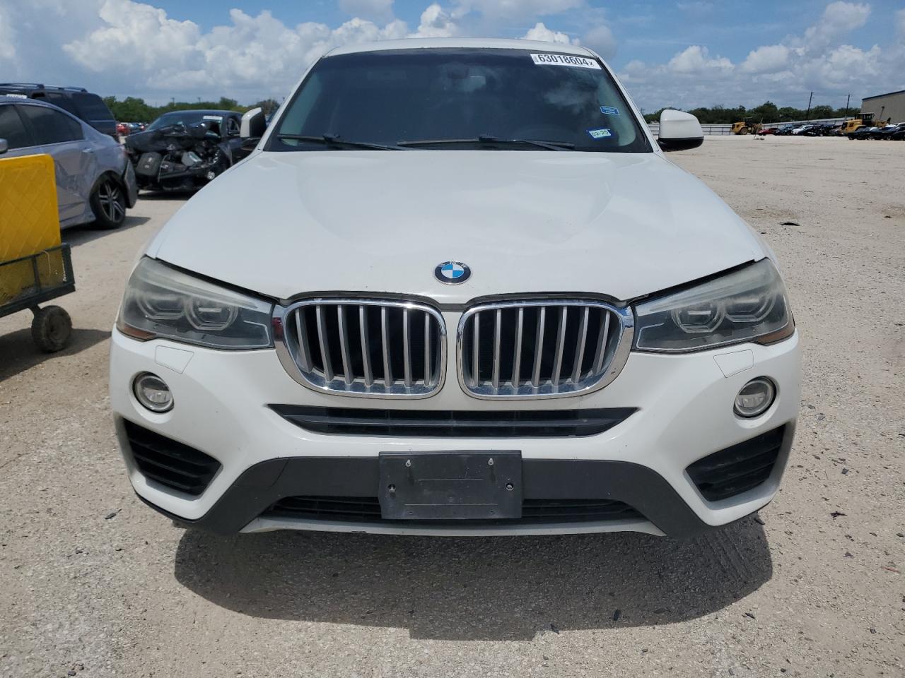 2015 BMW X4 xDrive28I VIN: 5UXXW3C53F0F89187 Lot: 63018604