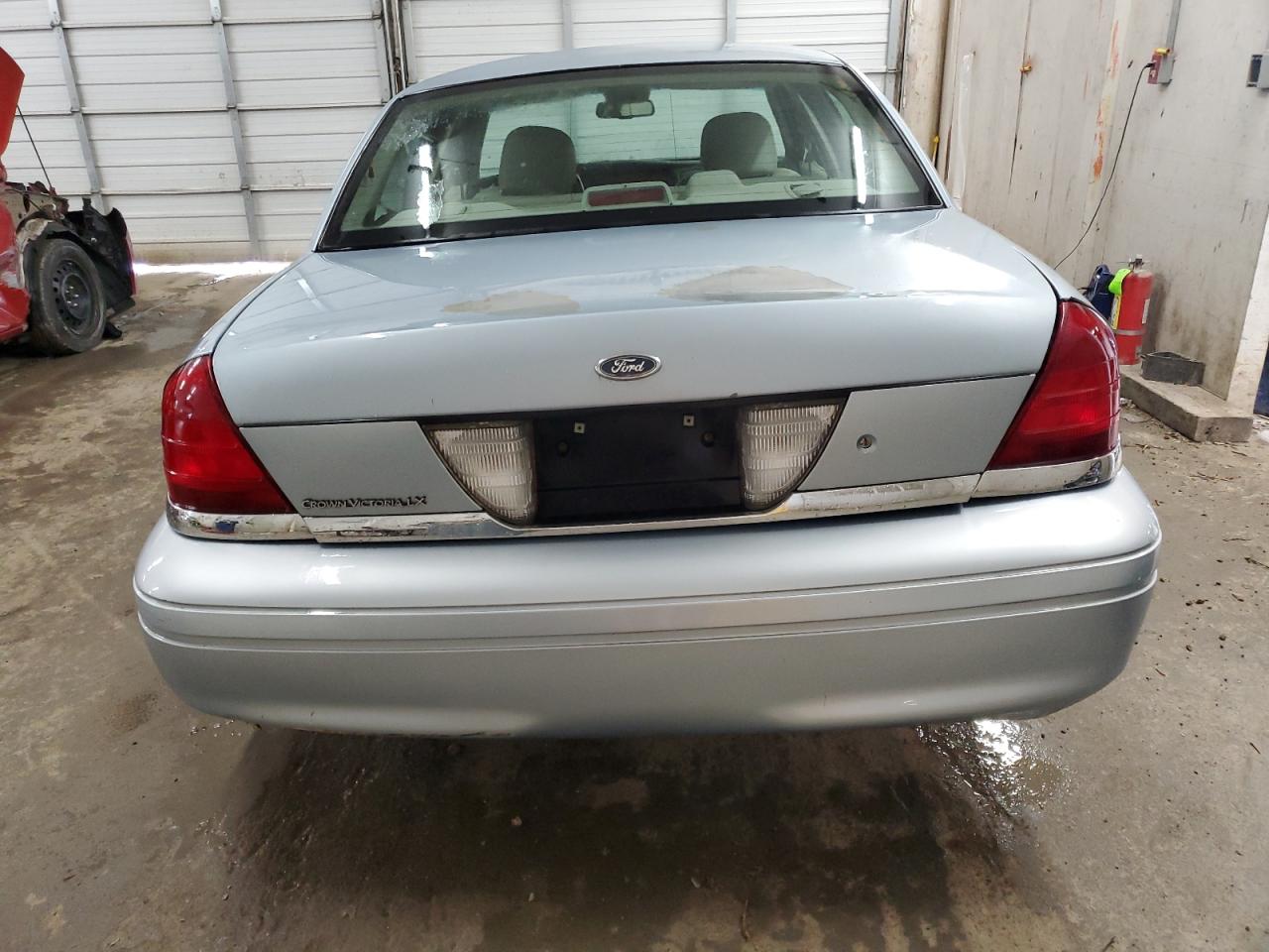 2007 Ford Crown Victoria Lx VIN: 2FAFP74VX7X147674 Lot: 64880014