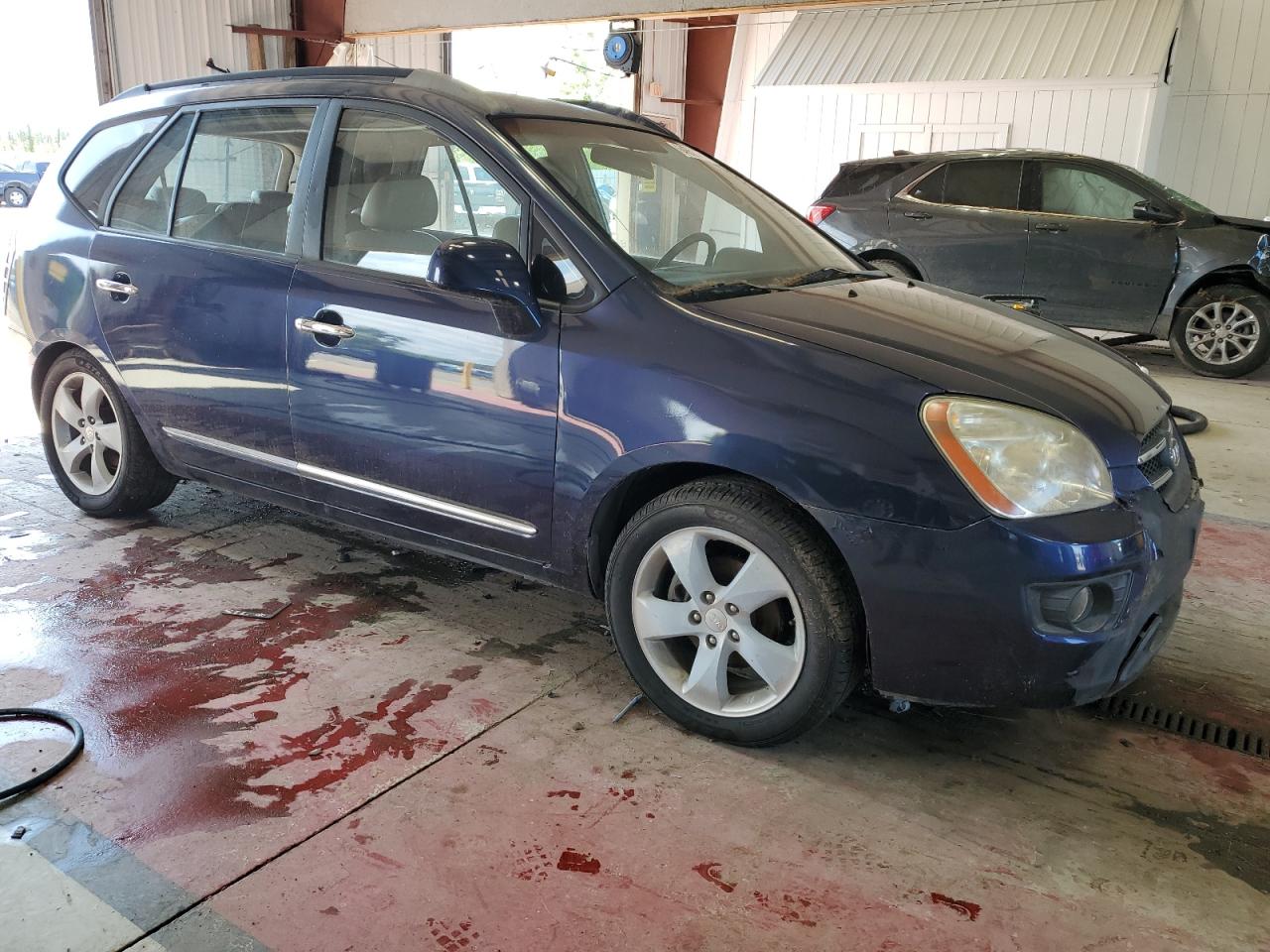 2007 Kia Rondo Lx VIN: KNAFG526177084493 Lot: 64652624
