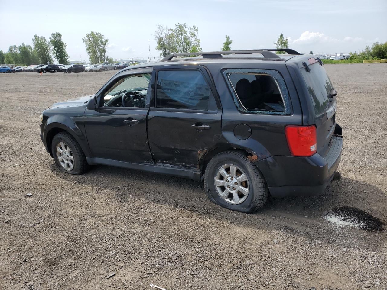 2011 Mazda Tribute I VIN: 4F2CY0C74BKM05106 Lot: 64842864