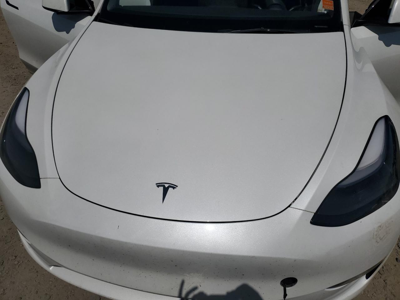 2023 Tesla Model Y VIN: 7SAYGDEE8PF764543 Lot: 62630834