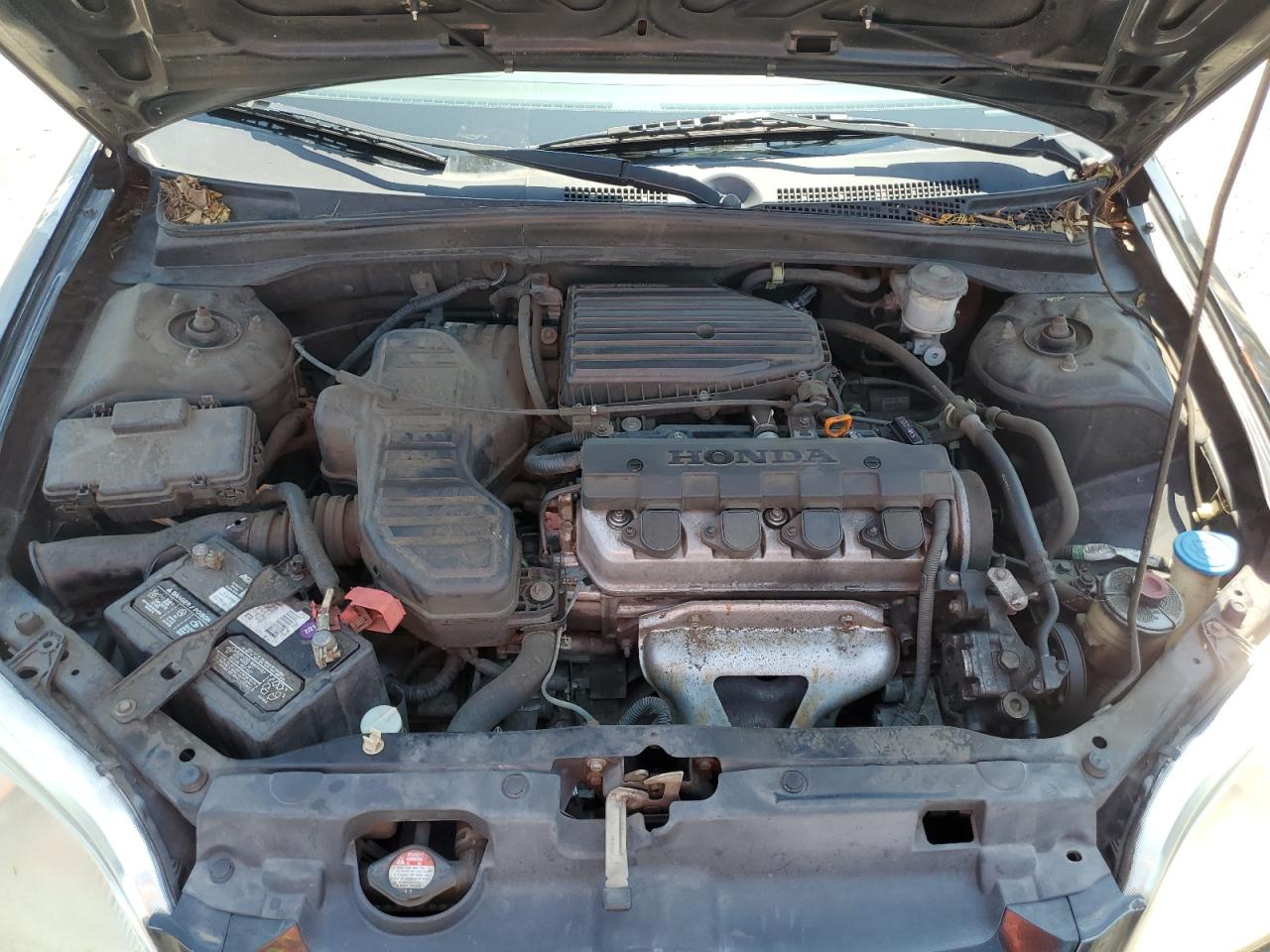 2003 Honda Civic Dx VIN: 1HGEM22243L074806 Lot: 64508914