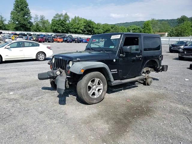 2011 Jeep Wrangler Sport VIN: 1J4AA2D1XBL570213 Lot: 63454544