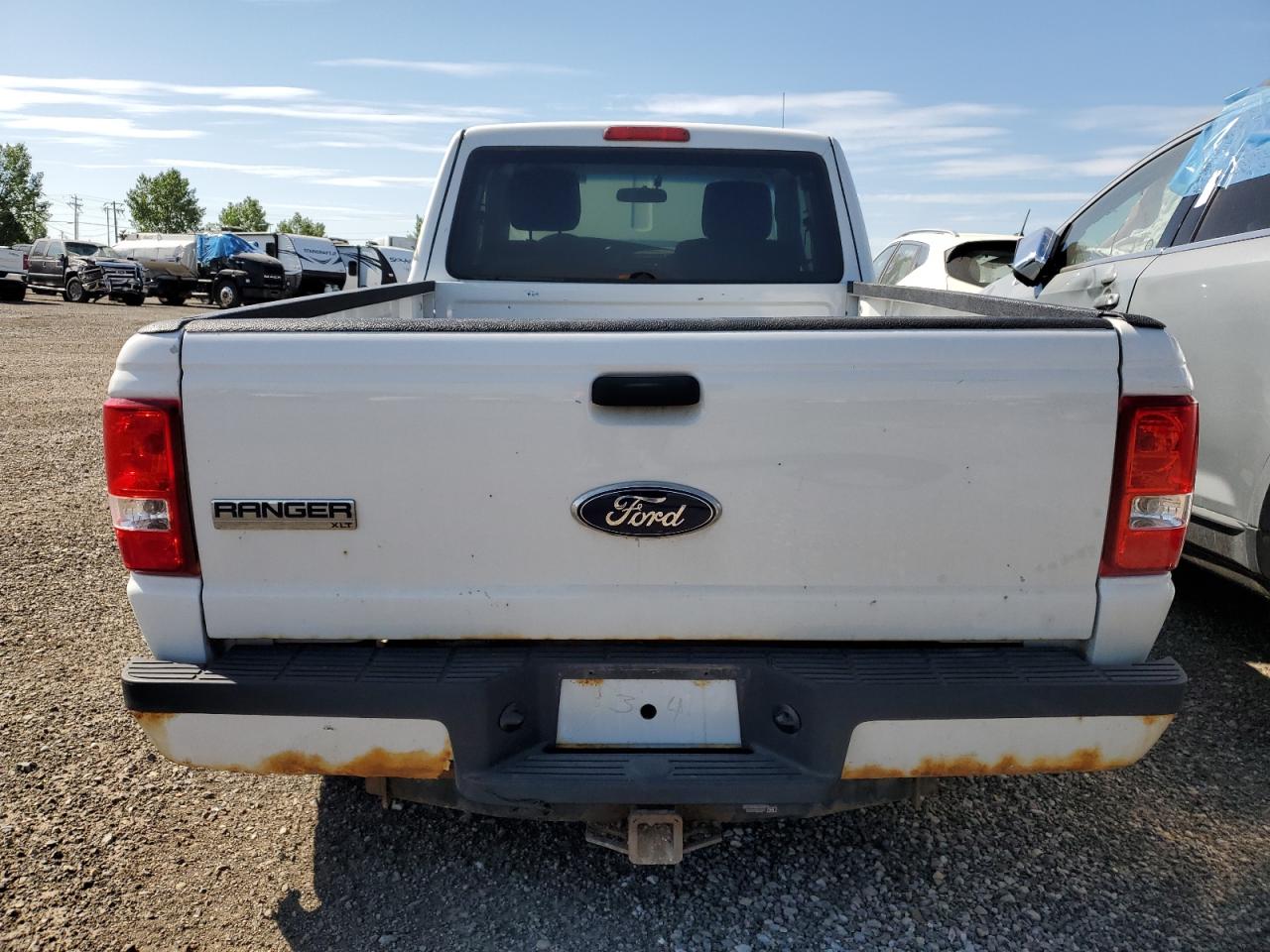 2011 Ford Ranger Super Cab VIN: 1FTLR4FEXBPA40562 Lot: 63122594
