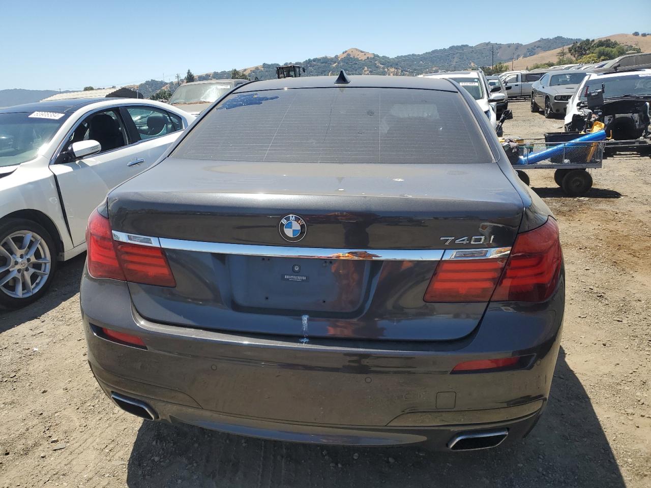 2015 BMW 740 I VIN: WBAYA6C56FD826828 Lot: 63878774