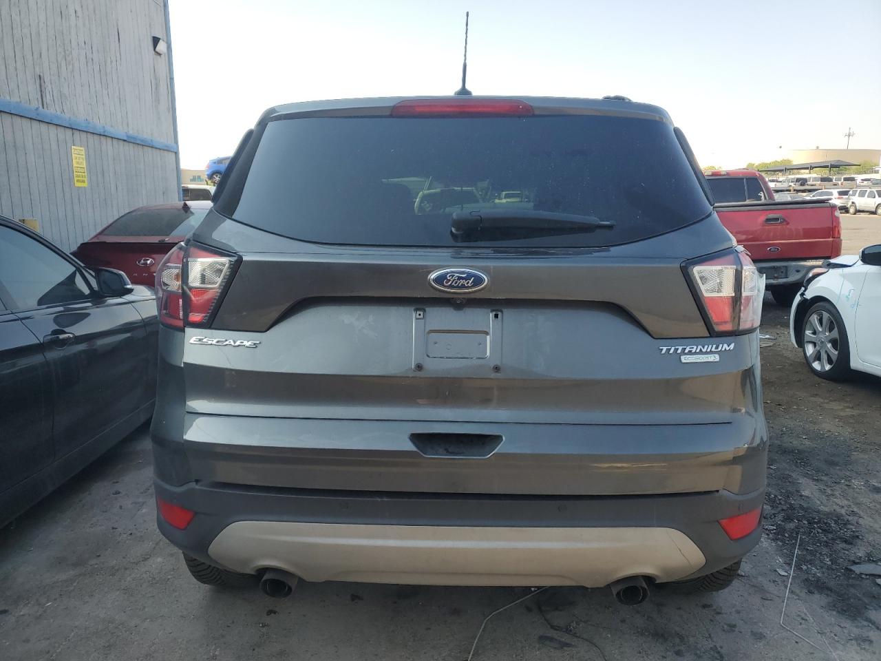 2017 Ford Escape Titanium VIN: 1FMCU0J9XHUC14055 Lot: 63858184