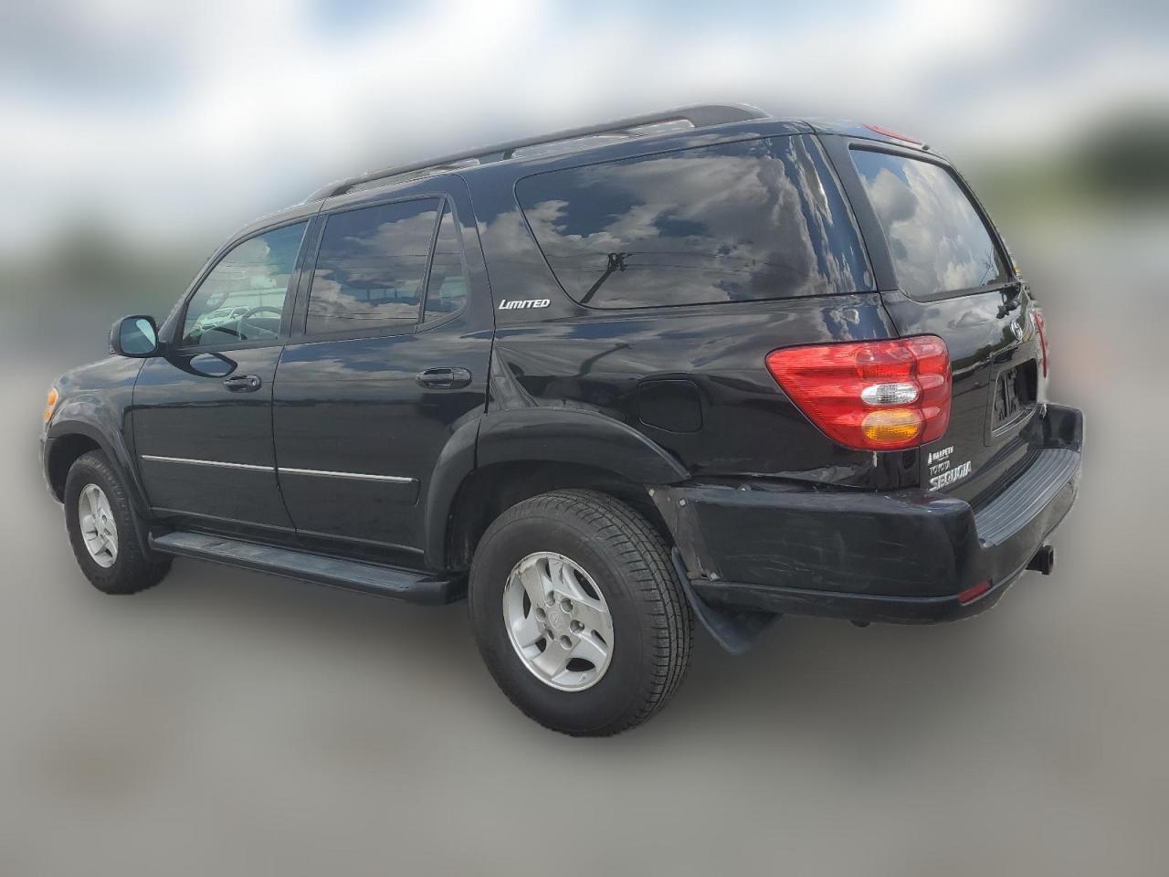 2002 Toyota Sequoia Limited VIN: 5TDZT38A52S057453 Lot: 63751324