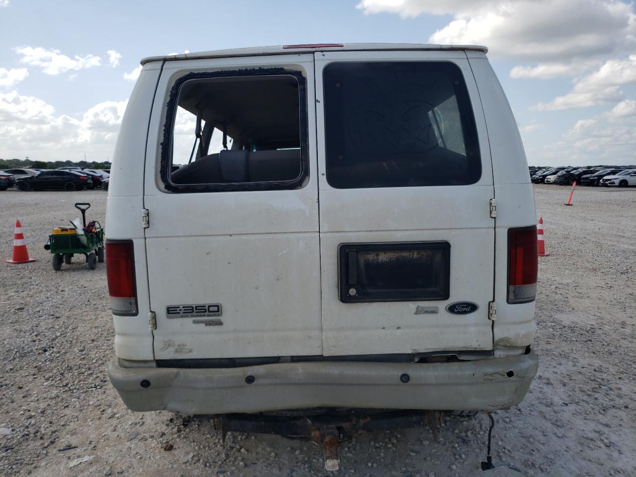 2010 Ford Econoline E350 Super Duty Wagon VIN: 1FBNE3BL4ADA18256 Lot: 65124294