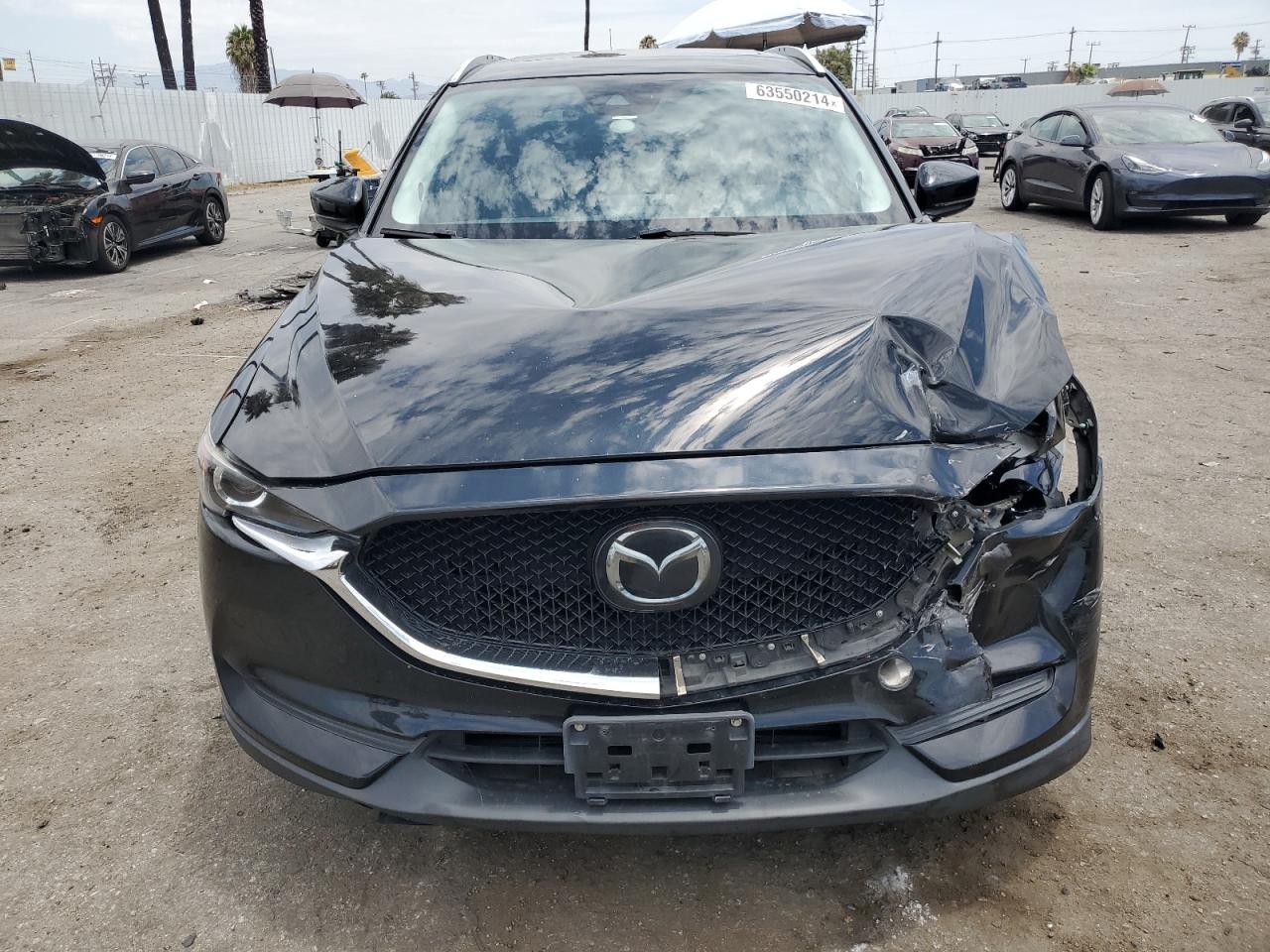 2019 Mazda Cx-5 Touring VIN: JM3KFACM1K1502905 Lot: 63550214