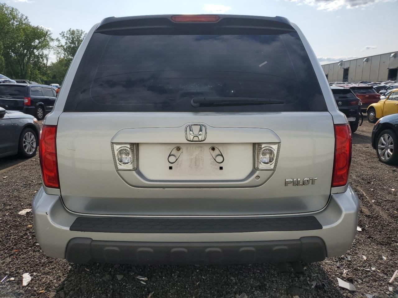2005 Honda Pilot Lx VIN: 2HKYF18155H555962 Lot: 65118664