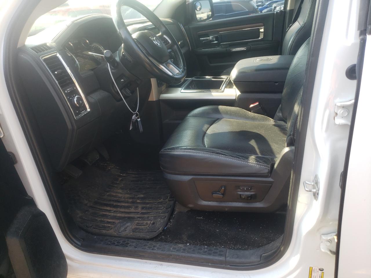 2015 Ram 1500 Laramie VIN: 1C6RR7NM2FS588103 Lot: 64982704