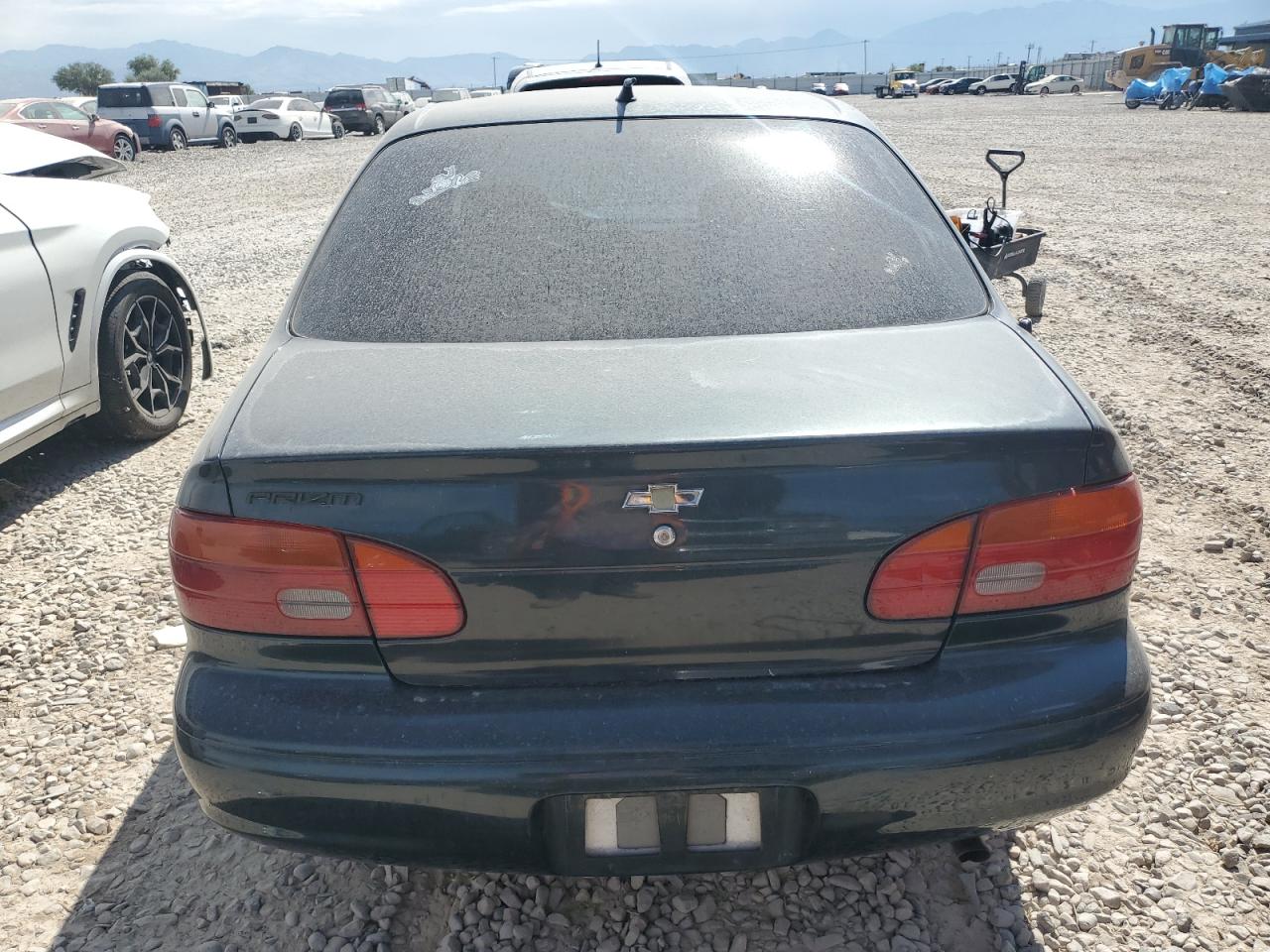 1999 Chevrolet Geo Prizm Base VIN: 1Y1SK5282XZ423120 Lot: 64604594