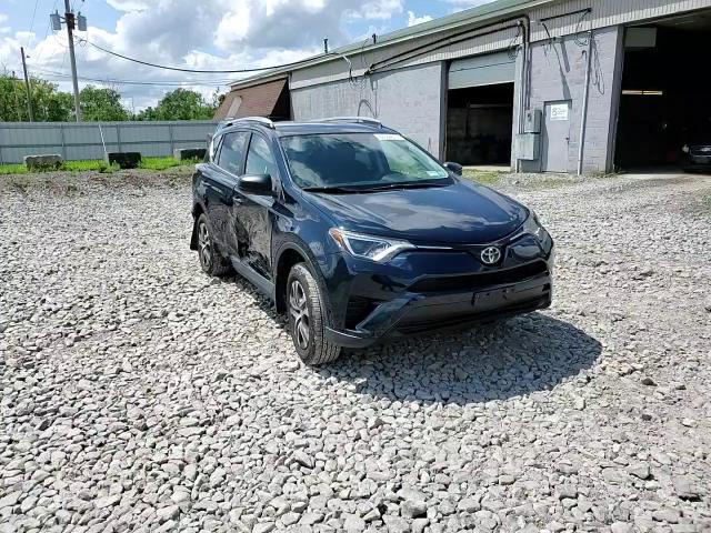 2018 Toyota Rav4 Le VIN: 2T3BFREV1JW735146 Lot: 63584874