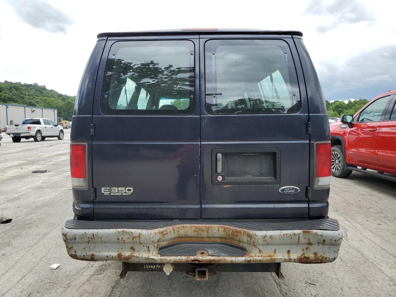 1999 Ford Econoline E350 Super Duty Wagon VIN: 1FBSS31FXXHA15905 Lot: 62394364