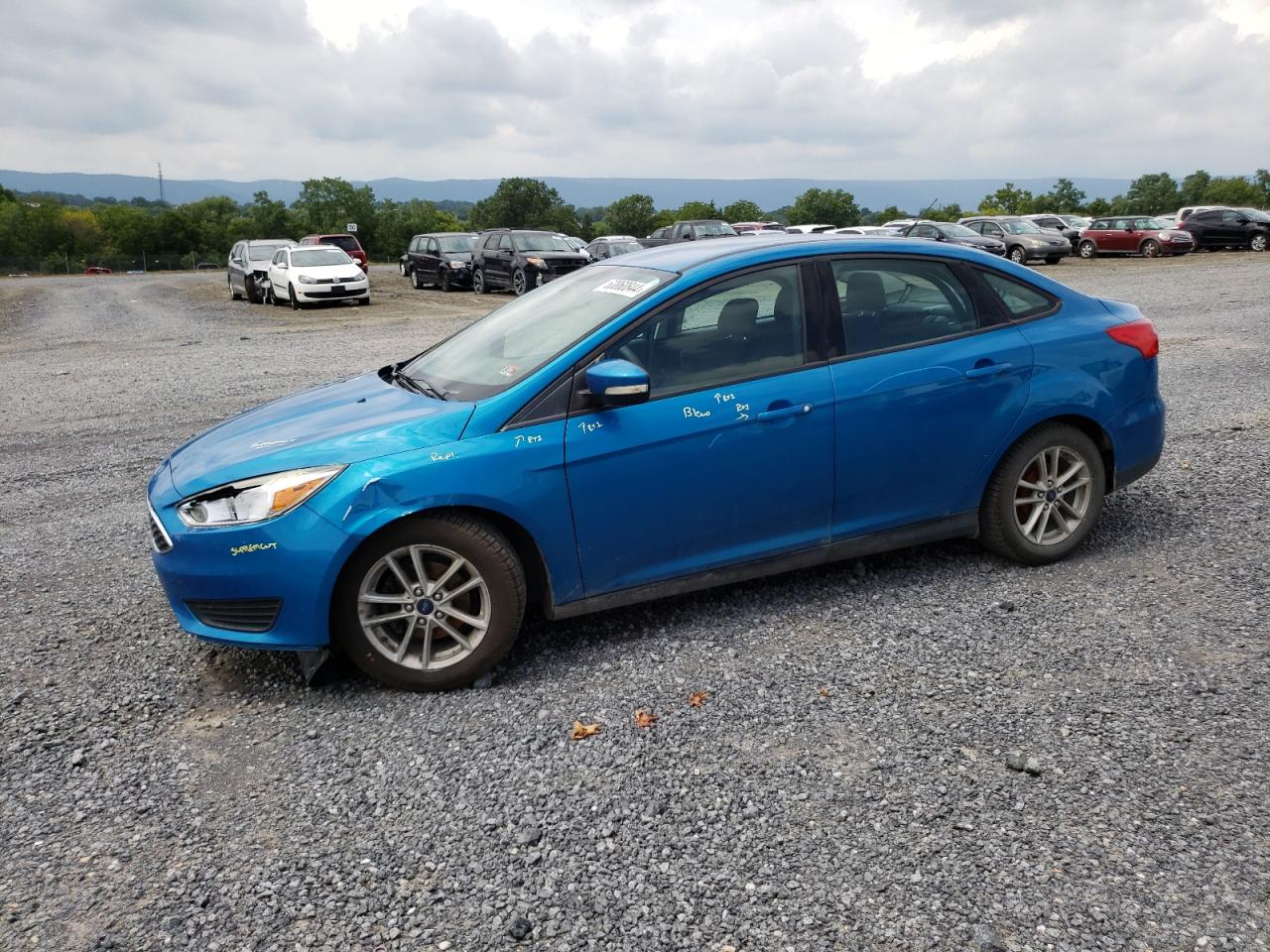 2015 Ford Focus Se VIN: 1FADP3F25FL233621 Lot: 63860844