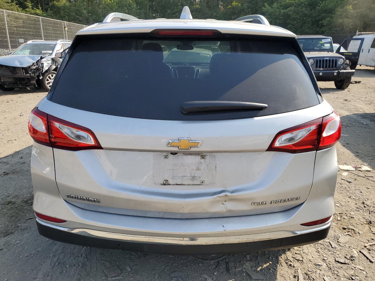 2021 Chevrolet Equinox Premier VIN: 3GNAXXEV9MS145301 Lot: 65394404