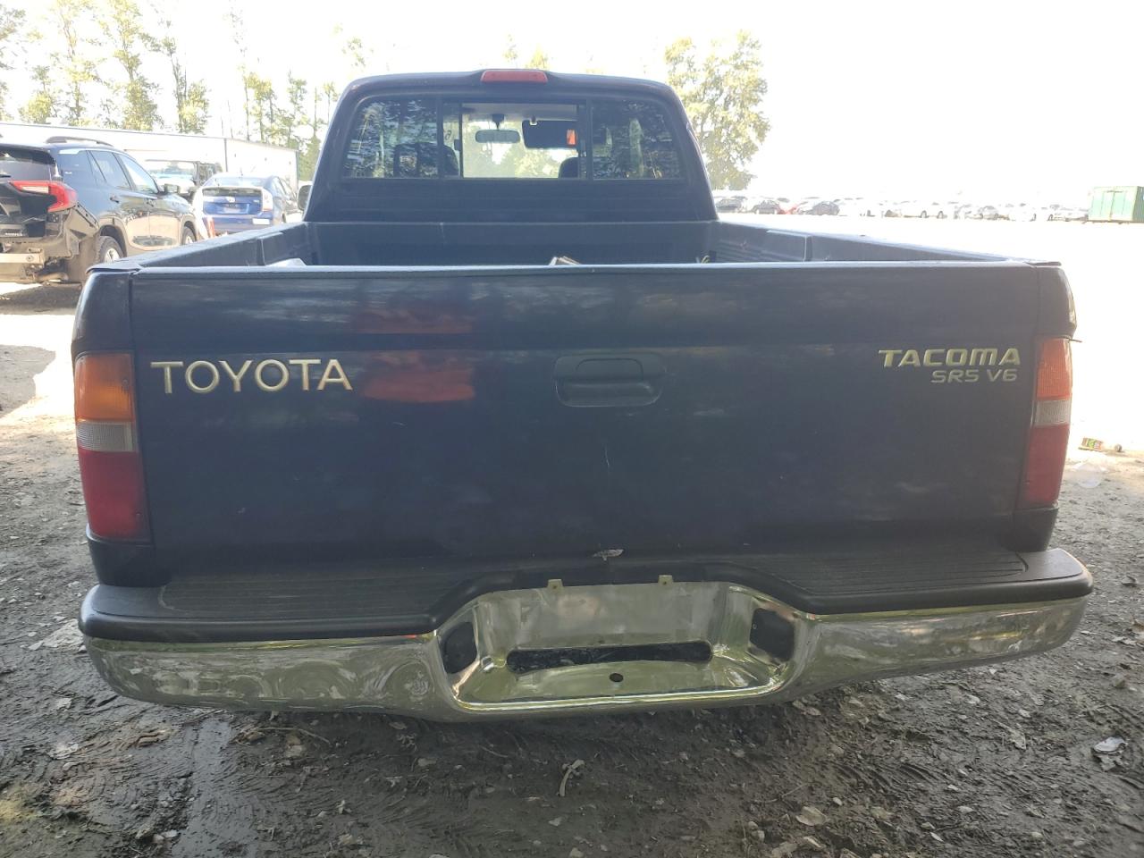 1999 Toyota Tacoma Xtracab VIN: 4TAWN72N7XZ572469 Lot: 61088004