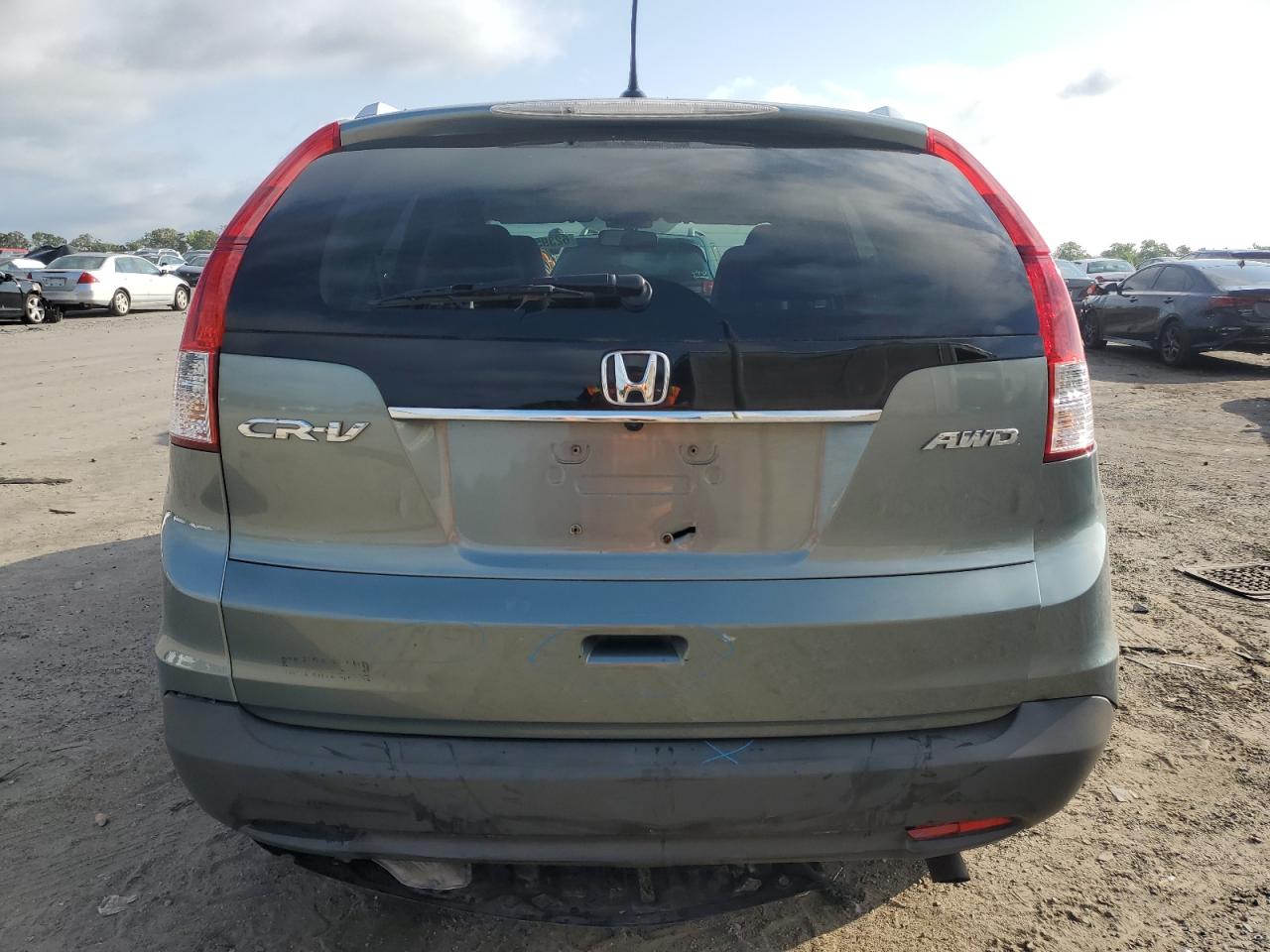 2012 Honda Cr-V Exl VIN: 5J6RM4H74CL061904 Lot: 62395104