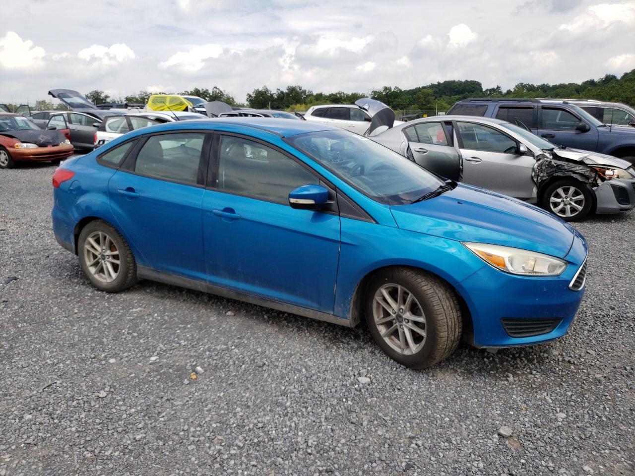 2015 Ford Focus Se VIN: 1FADP3F25FL233621 Lot: 63860844