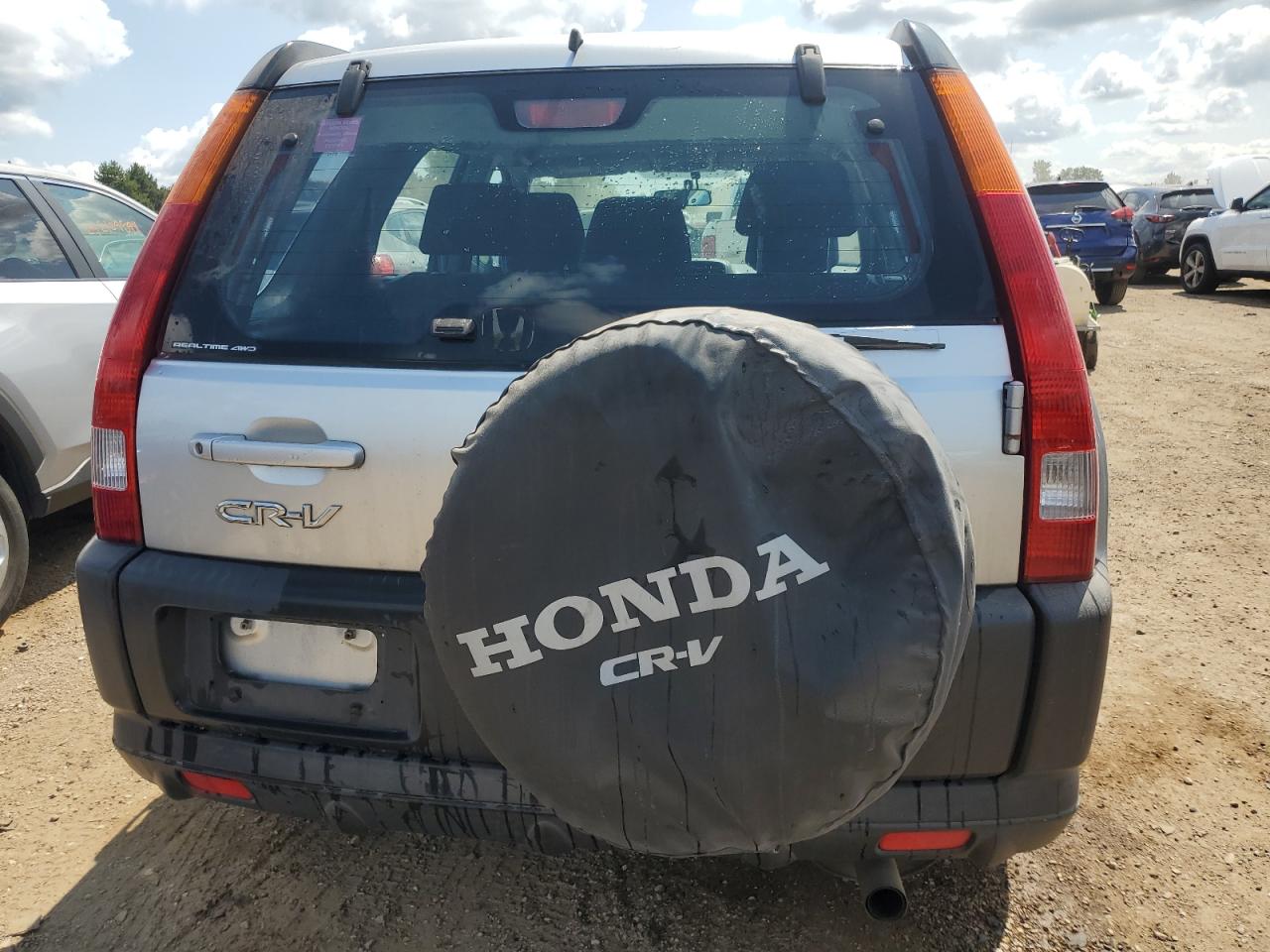 2004 Honda Cr-V Lx VIN: JHLRD78474C052745 Lot: 64203264