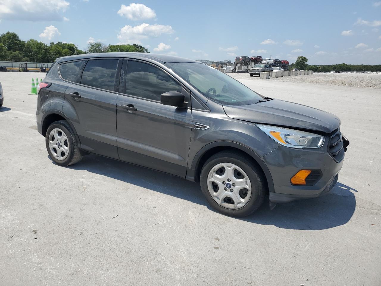 2017 Ford Escape S VIN: 1FMCU0F71HUD21048 Lot: 63012574