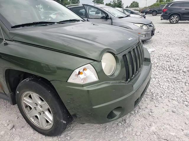 2009 Jeep Compass Sport VIN: 1J4FT47B09D165000 Lot: 65202374