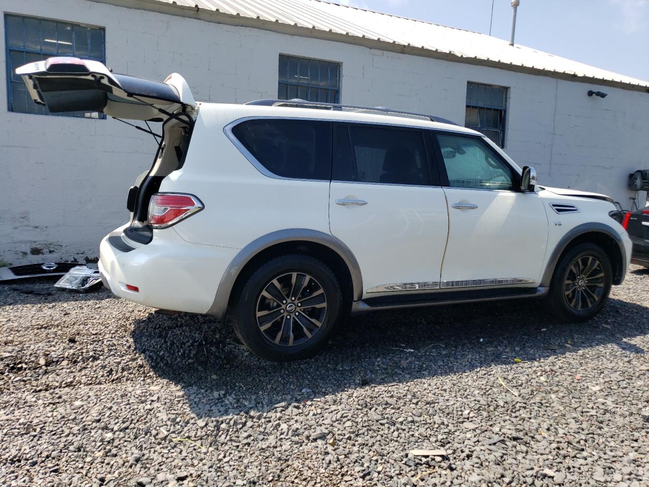 2017 Nissan Armada Platinum VIN: JN8AY2NE8H9704746 Lot: 63505824
