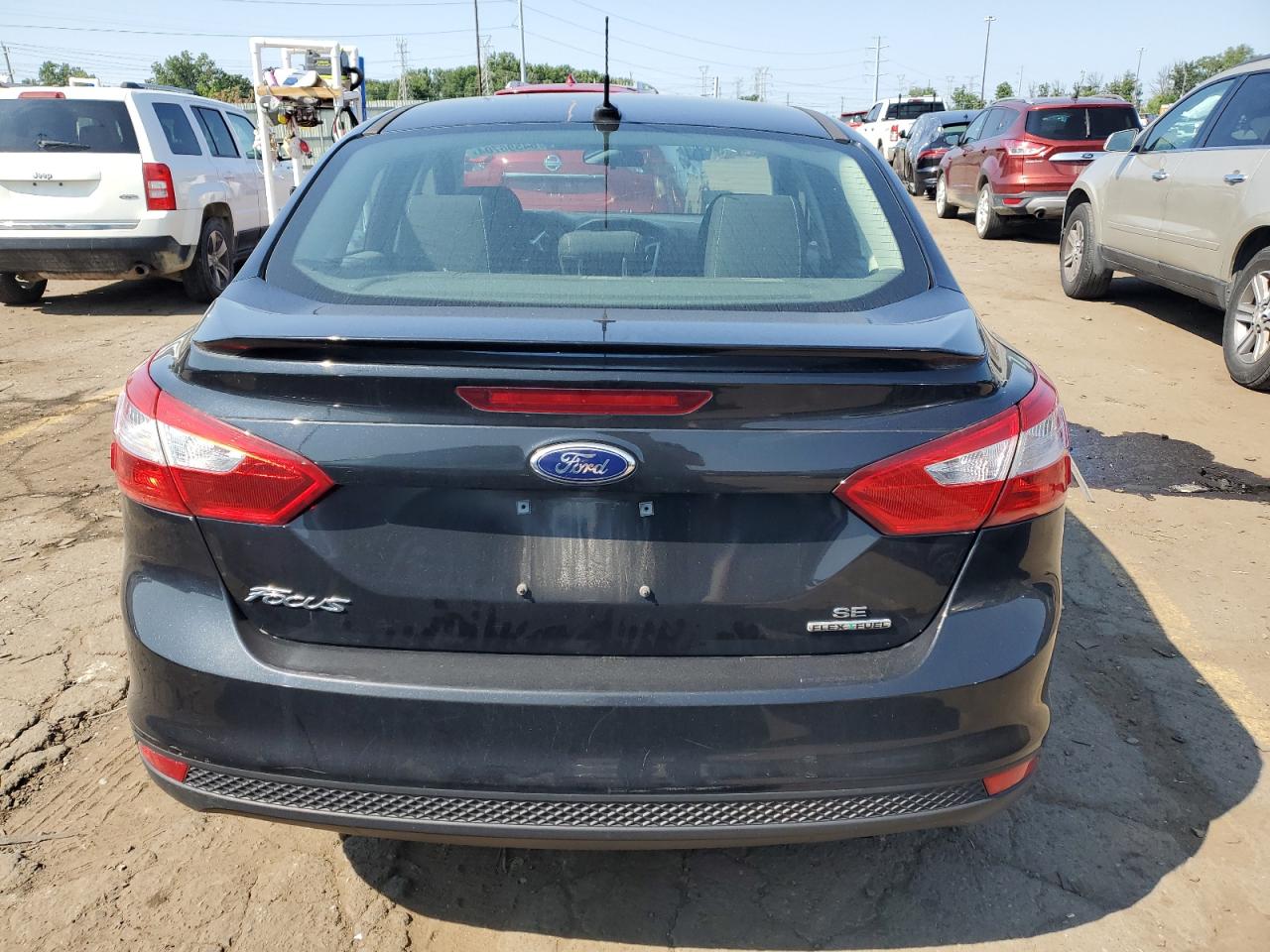 2014 Ford Focus Se VIN: 1FADP3F27EL275707 Lot: 64596704